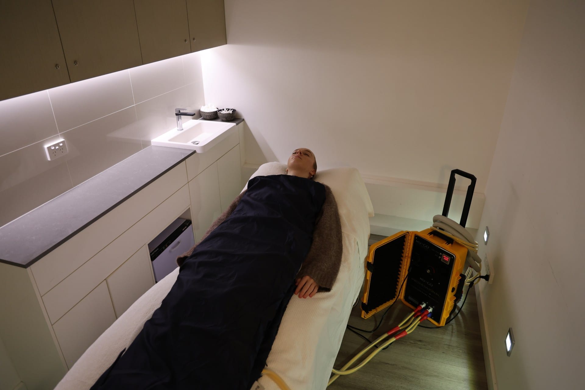 Client receiving HUGO High Intensity PEMF therapy